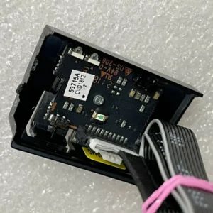 a black electronic device with wires