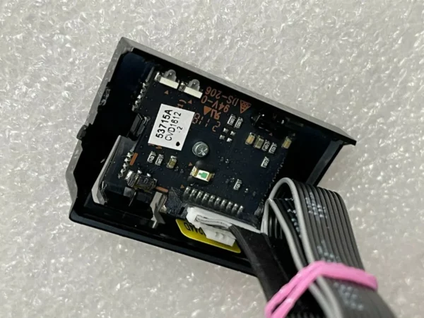 a black electronic device with wires