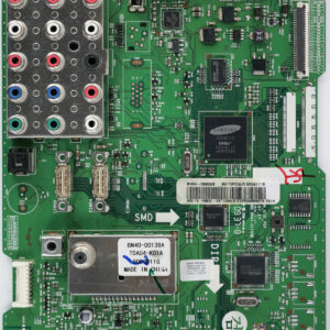 a green circuit board with many connectors