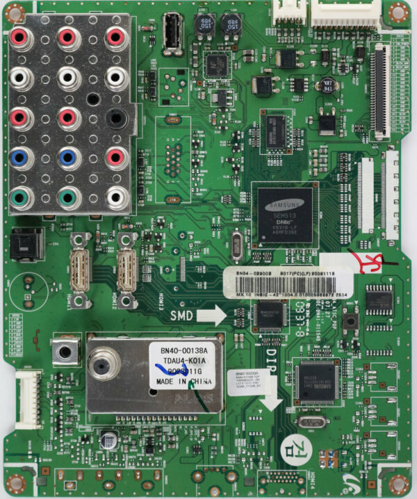 a green circuit board with many connectors