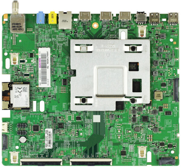 a green circuit board with many different components