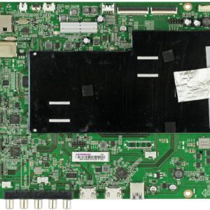 a green circuit board with black rectangular object