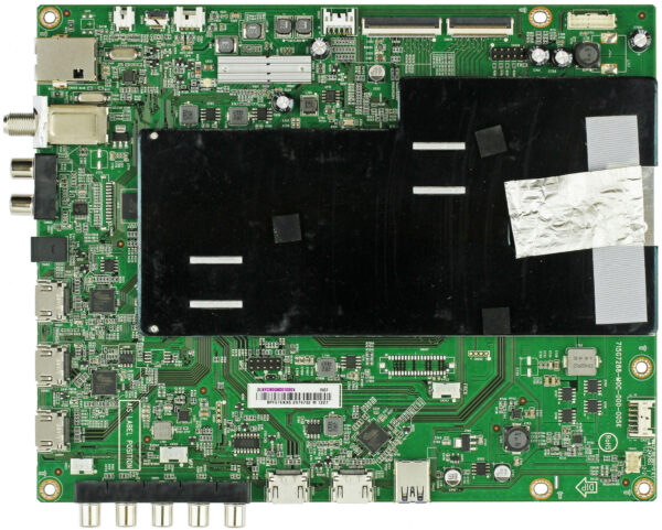 a green circuit board with black rectangular object